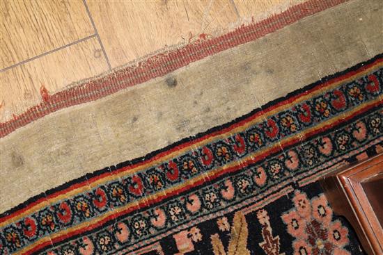 A Persian carpet, 343cm x 236cm